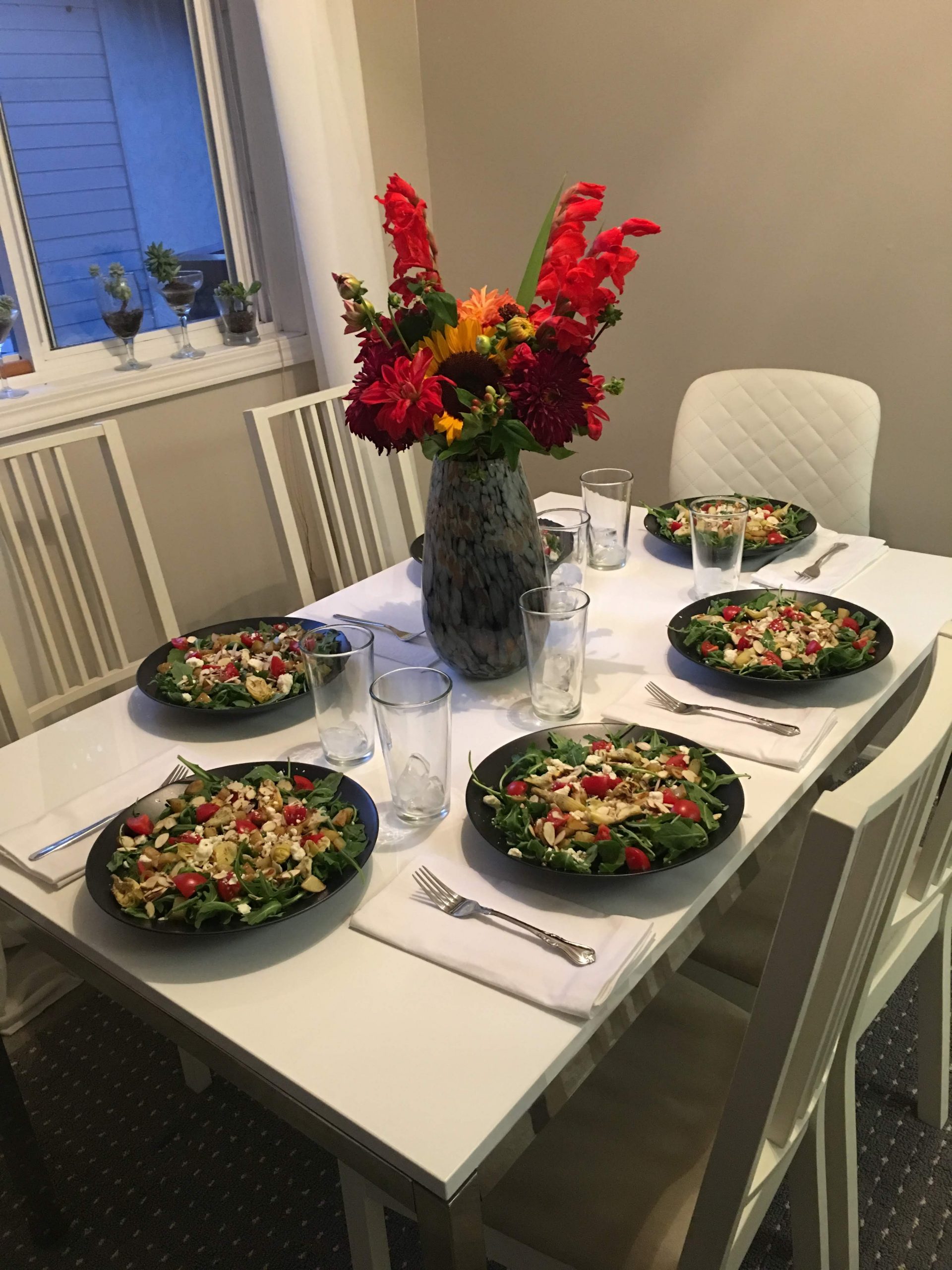 Plates of food on a table.